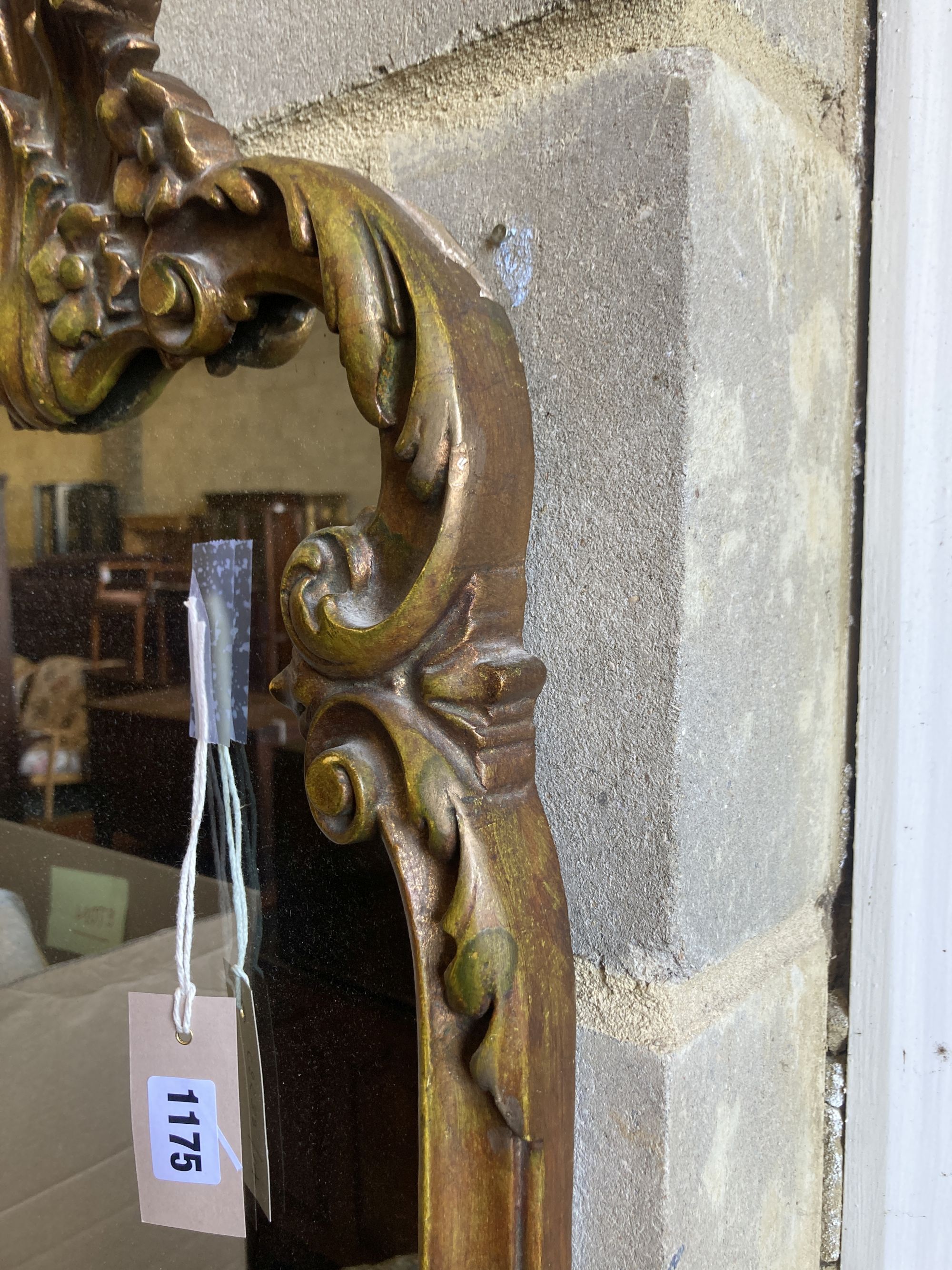 A small 18th century style gilt framed wall mirror, width 39cm, height 73cm